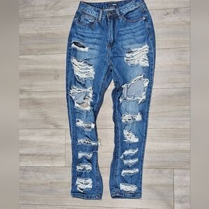 Front & Back Distressed Ripped Blue Skinny Jeans $60 Fashion Nova size 25 waist